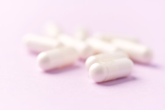 Citicoline capsules. Citicoline is a supplement that boost brain performance and improve memory. Bright background. Soft focus. Close up. Copy space
