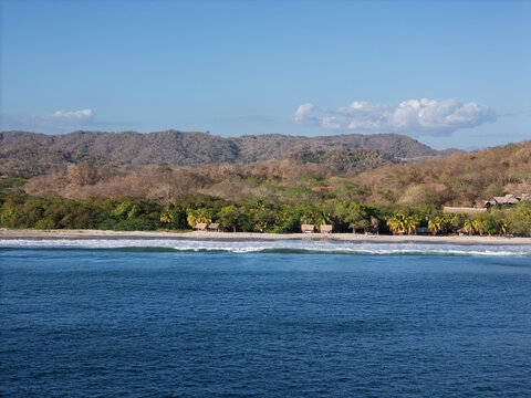 Tropical beach with big waves aerail view