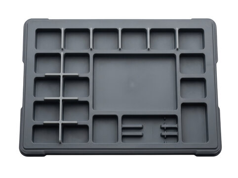 Industrial grey plastic storage tray with multiple compartments isolated on transparent background for professional organizational use