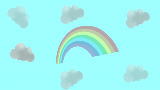 Colorful rainbow and fluffy clouds on a bright blue sky background