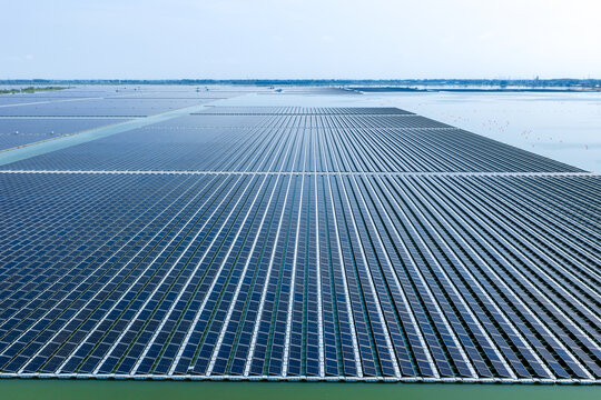 floating solar power plant on water surface with photovoltaic panels