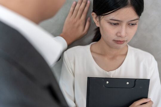 Manager or senior sexually harassed a female colleague. Sexual harassment in office. feel anxious and stressed from being harassed. molest, assault, inappropriate, discrimination, abuse
