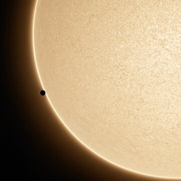 Stellar disc with fine granulation and a dark super earth exoplanet in transit, for astronomy and science communication