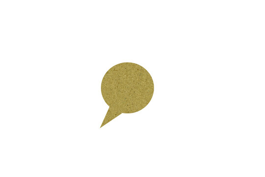 Recycled kraft paper speech bubble icon isolated on dark background for communication and feedback concept