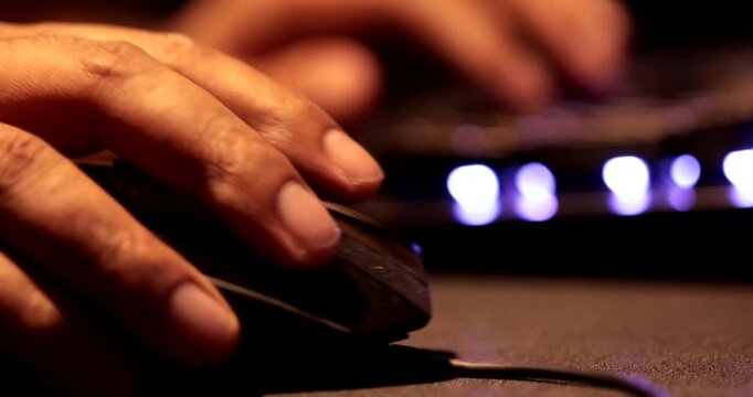 Close Up of Man Hand Using Computer Mouse Working on Desktop Workstation