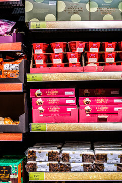 Marks And Spencer Shelves Filled With Christmas Chocolate Bombes, Mince Pies, And Rich Fruit Cakes