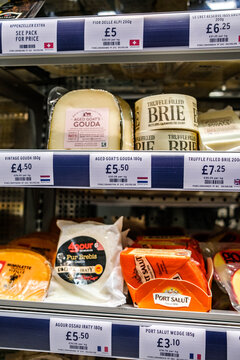 Marks And Spencer Display Featuring Premium Continental European Cheeses With Price Labels