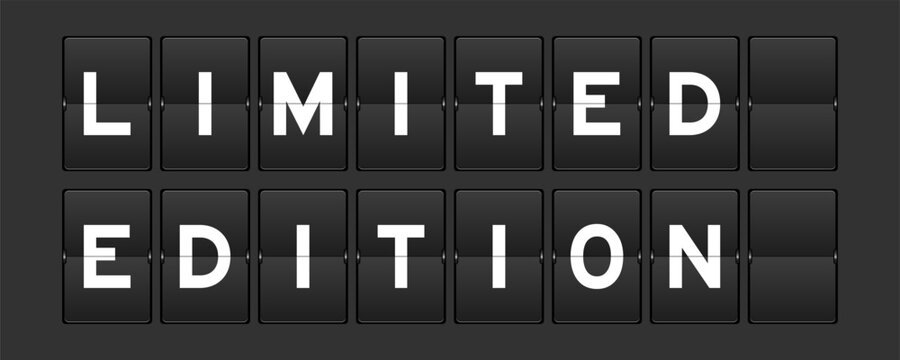 Black color analog flip board with word limited edition on gray background