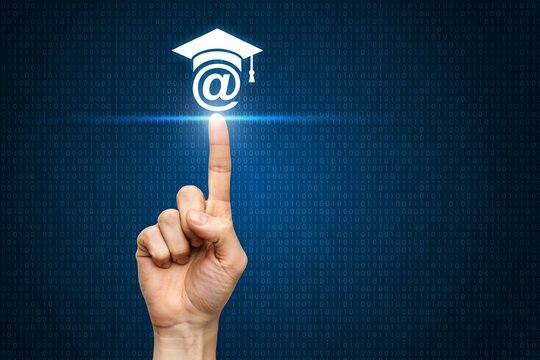 Human finger touching a glowing digital graduation cap icon with an at symbol on a blue binary background