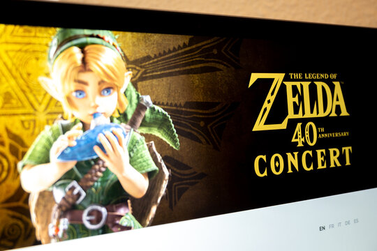 Link playing ocarina at zelda concert anniversary