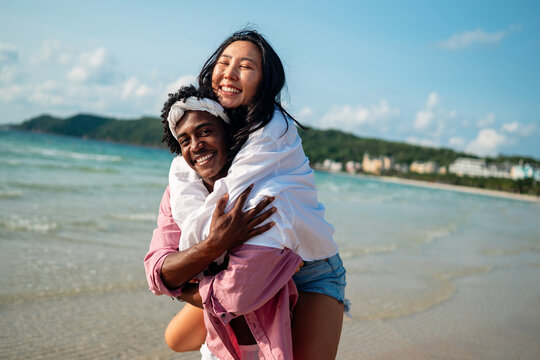 Couple enjoying their tropical vacation with peace of mind, secured by reliable travel insurance
