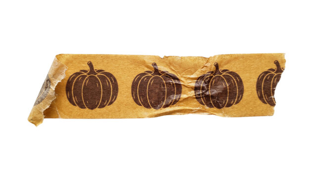 Orange pumpkin patterned washi tape with torn edges, useful for scrapbooking, journaling, and autumn-themed crafts.