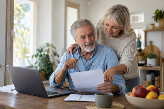 Senior couple sharing knowledge in a warm candid moment