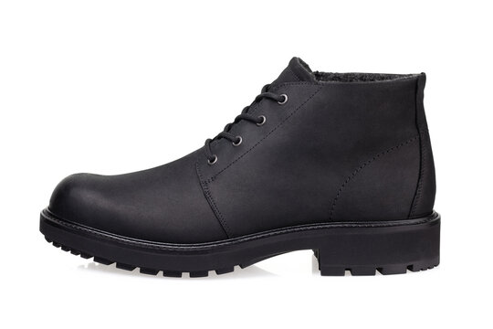 Black nubuck winter lace up boot with fur lining and lug sole isolated on white background side view