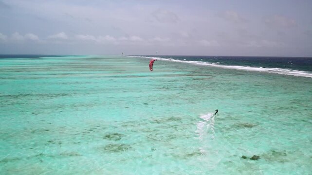 Aerial view of kitesurfer in Los Roques archipelago, Venezuela.