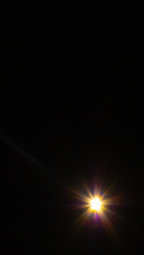 Sun flare on the black background