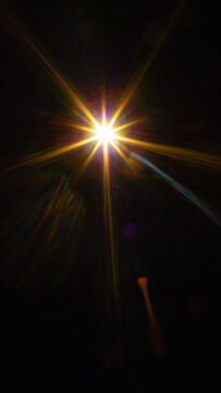 Sun flare on the black background