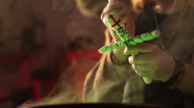 woman's hands holding a voodoo doll a cauldron emitting green steam people poking the doll with a needle. Everyday life intertwined with traditional witchcraft, magic, and a mystical atmosphere.