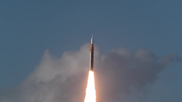 A stunning cinematic 4K video featuring a powerful rocket launch ascending into space with blazing engines, thick smoke, and dramatic liftoff from a modern launch pad.
