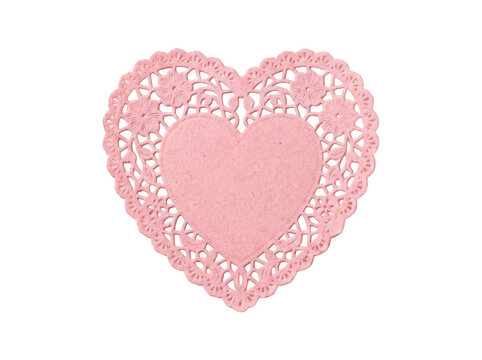 Pink paper heart doily isolated on white background