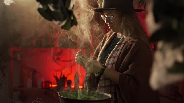 A realistic witch brewing a potion. She holds a voodoo doll over the cauldron, pricks it with a needle, and recites a spell. Everyday life intertwined with traditional witchcraft.