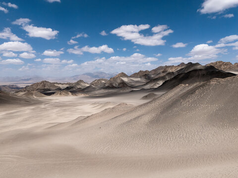 Black Dushan black volcanic rock and white desert landscape