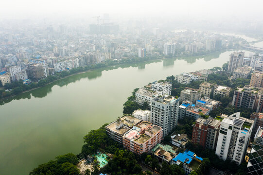 Aerial view of Gulshan 2 and the surrounding urban landscape with high-rise buildings and the green waters of Gulshan Lake in Dhaka, Dhaka Division, Bangladesh.