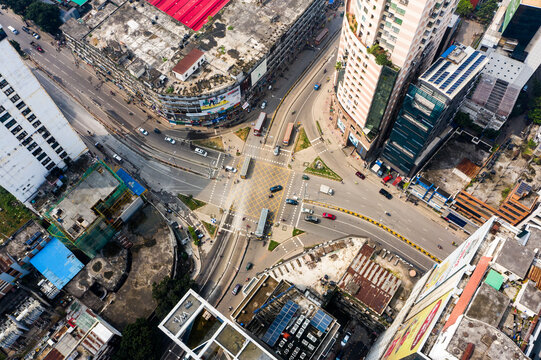 Aerial view of the busy Gulshan 2 intersection with urban traffic, commercial buildings, and road markings in Dhaka, Dhaka Division, Bangladesh.