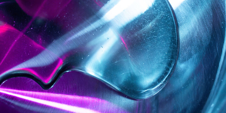 Abstract metallic surface with neon light and tech background