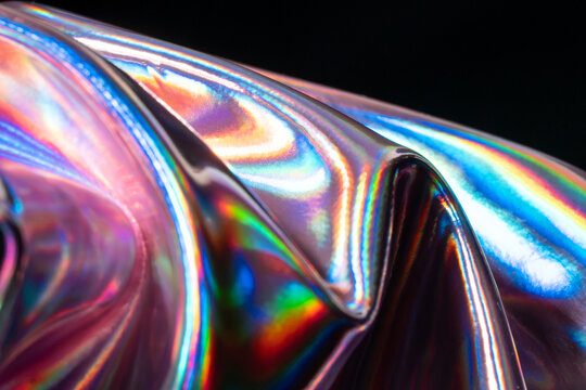 Iridescent holographic metal texture with colorful reflections