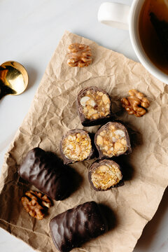 Healthy chocolate date sweet with walnut and tea