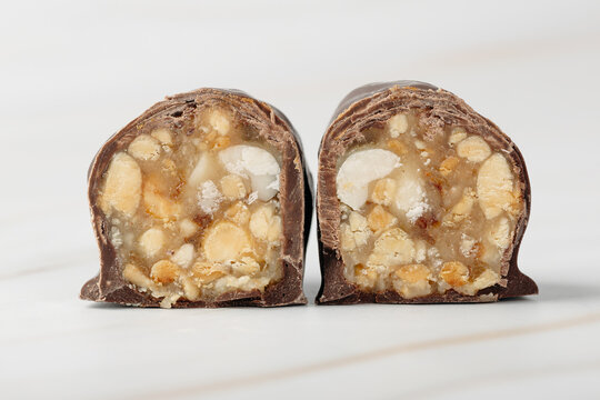 Chocolate-covered tea biscuit with crumbly sweet filling