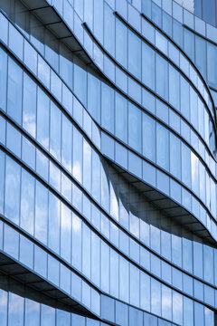 Curved geometric facade of contemporary office building