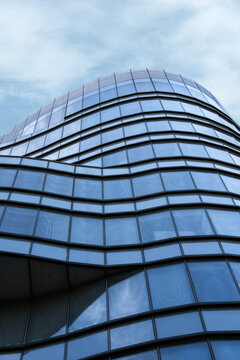 Curved geometric facade of a contemporary office building