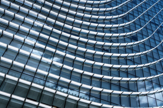 Curved geometric facade of contemporary office building