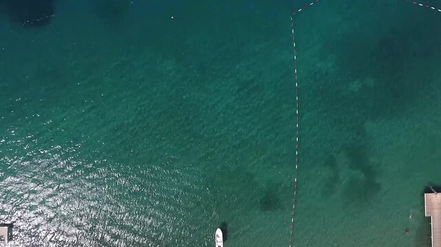 Aerial view of Bodrum beach and wooden pier, Turkiye.