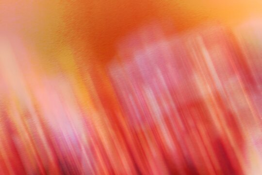 Abstract blurred colorful background with warm diagonal streaks