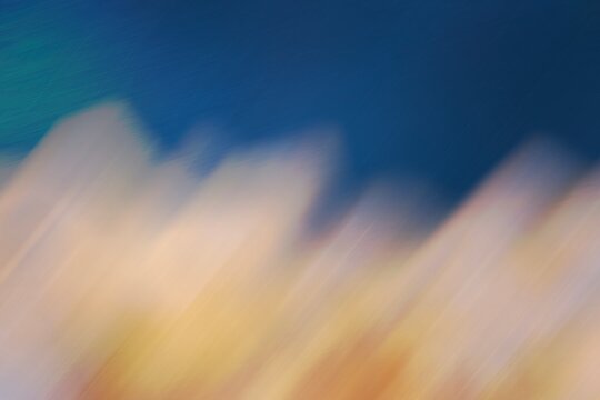 Abstract blurred colorful background with blue and pastel hues