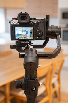 Camera on gimbal film modern apartment interior