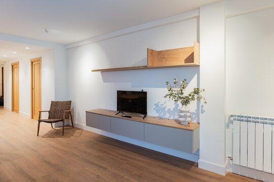 Modern apartment living room with minimalist tv cabinet
