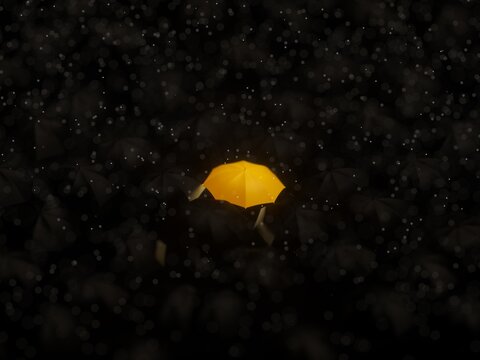 Yellow umbrella stand out among black umbrellas in rain