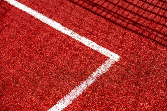 Red football stadium field corner line close-up