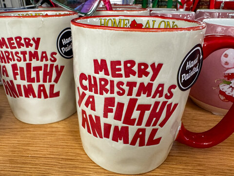 Mesa, Arizona - September 13, 2026: Home Alone Merry Christmas Ya Filthy Animal 90s themed coffee cup for sale at a Kohls department store