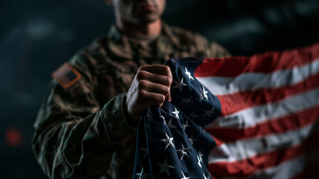 Soldier in Camouflage Uniform Holding American Flag