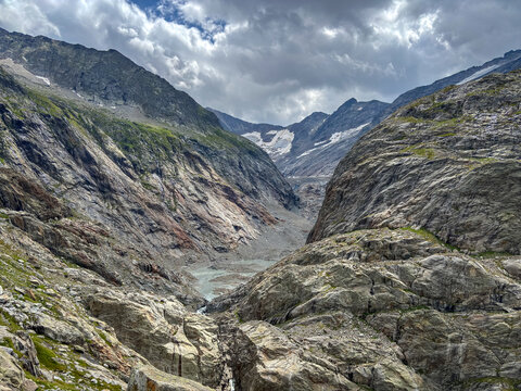 Glacial valley of Tre-La-Tete with rocky cliffs in Les Contamines-Montjoie, France