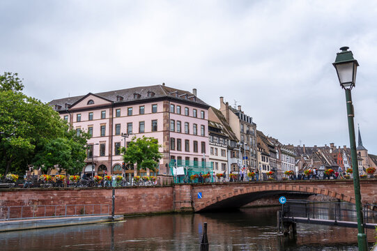 Bridge with flowers over the Ill river in Strasbourg, France