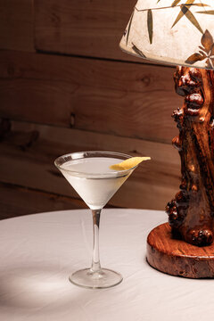 Elegant cocktail in a martini glass. The classic Vesper Martini, stylized background adds moody sophistication. Ideal for upscale bar or cocktail menus