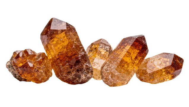 Group of faceted amber citrine quartz crystals, isolated on transparent background