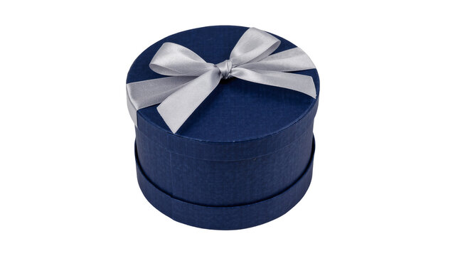 Dark blue round gift box with silver ribbon bow, isolated on transparent background