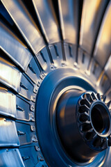 Fototapeta premium A detailed look at the internal workings of a jet engine, ideal for technology and industry-related uses. vertical frame